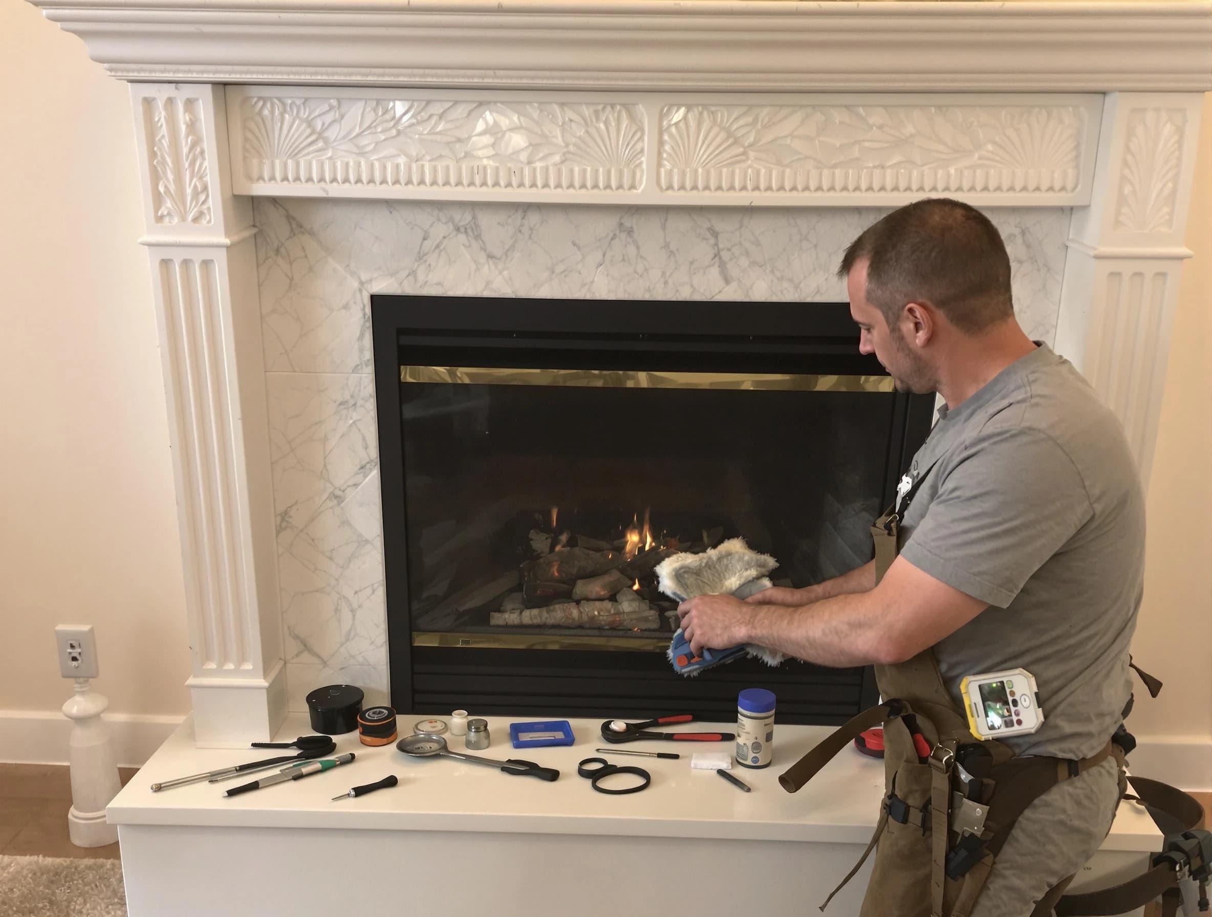 Plainsboro Chimney Sweep performing fireplace maintenance in Plainsboro, NJ